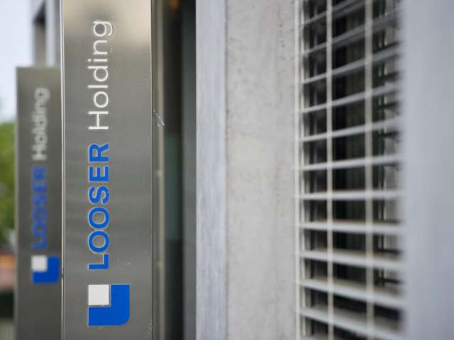 Looser Holding控股公司计划出售其涂料业务