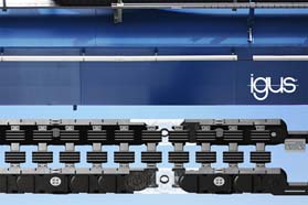 采用了滑动轴承的新款 igus 轮式拖链，使用寿命翻倍，更适用于长行程